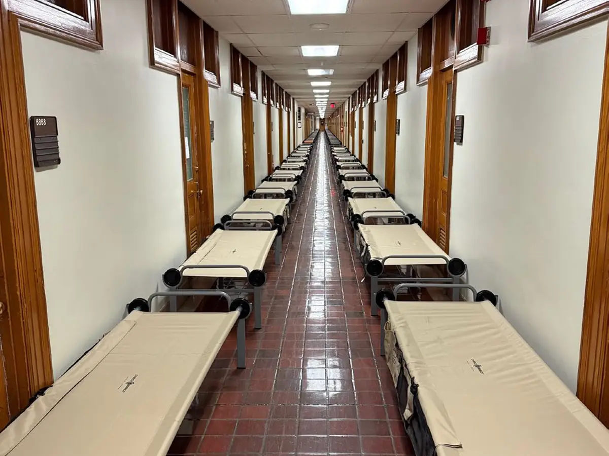 Cots installed in rows for a National Guard deployment