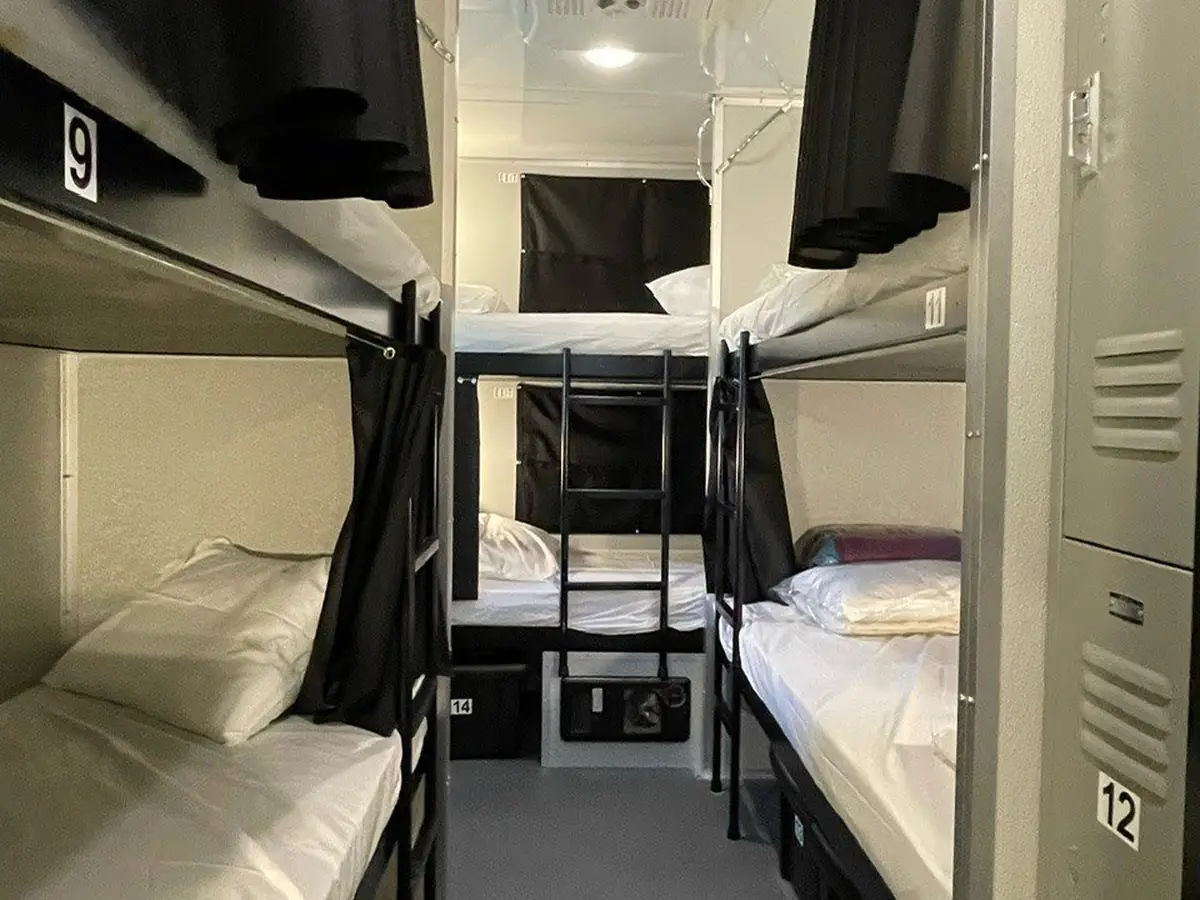 Bunk billeting with lockers inside a sleeper trailer