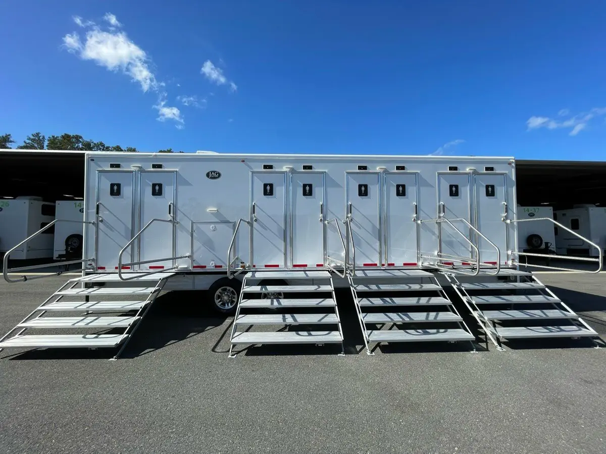 Restroom trailer staged on a project site