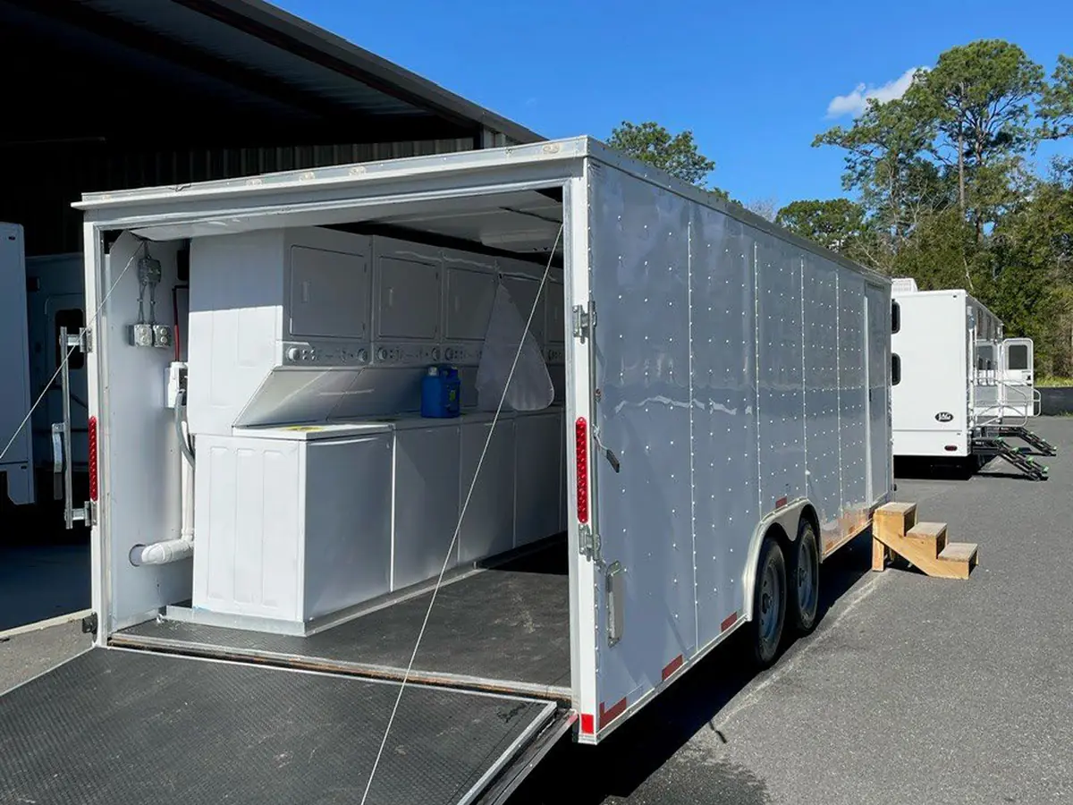 Trailer with ramp access staged on a site
